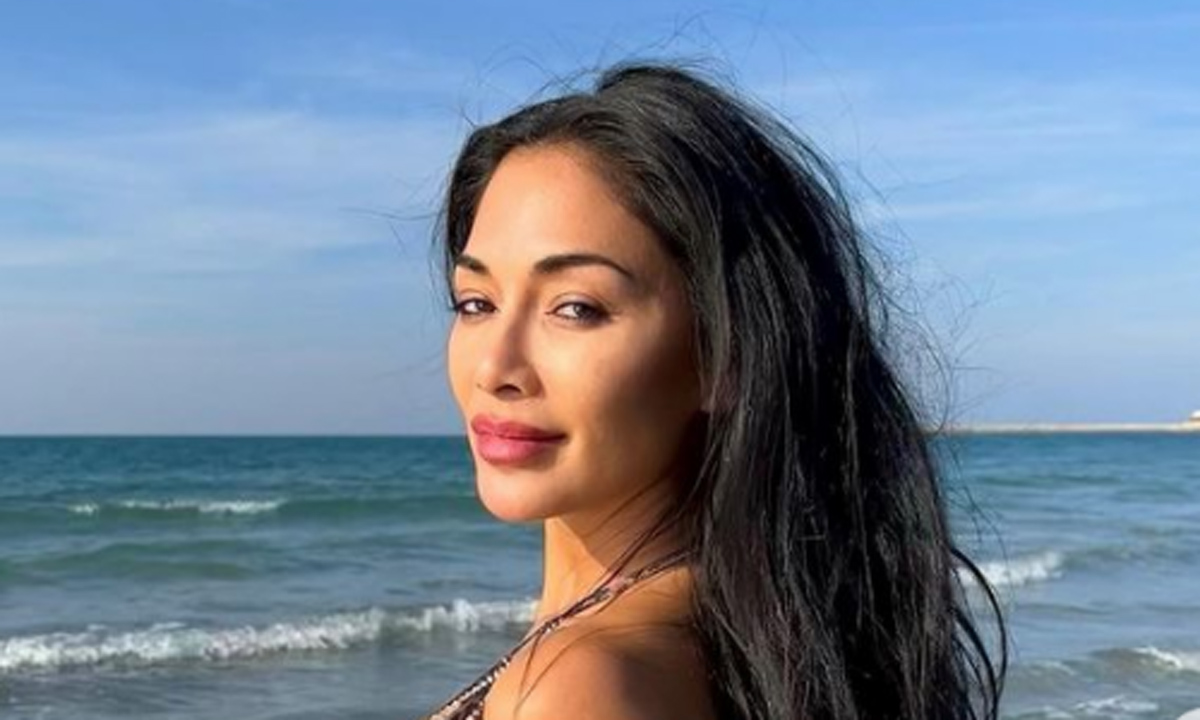 Nicole Scherzinger Showcases Her Flawless Figure In Tiny String Bikini