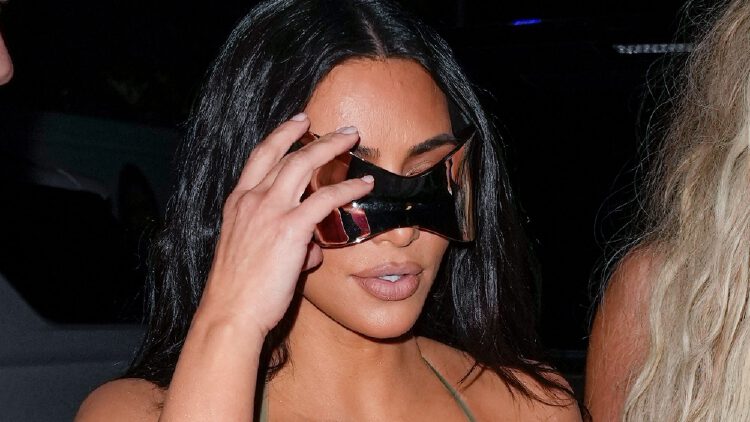 Kim Kardashian Stepped Out In A Silver Bikini Top And Matching