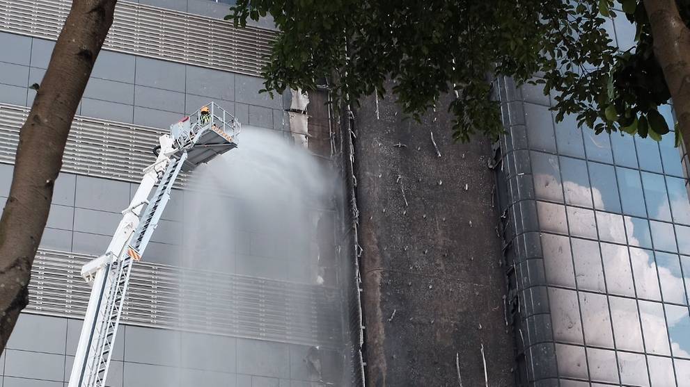Fire risk cladding tests, dismantling underway as SCDF assesses buildings: Shanmugam