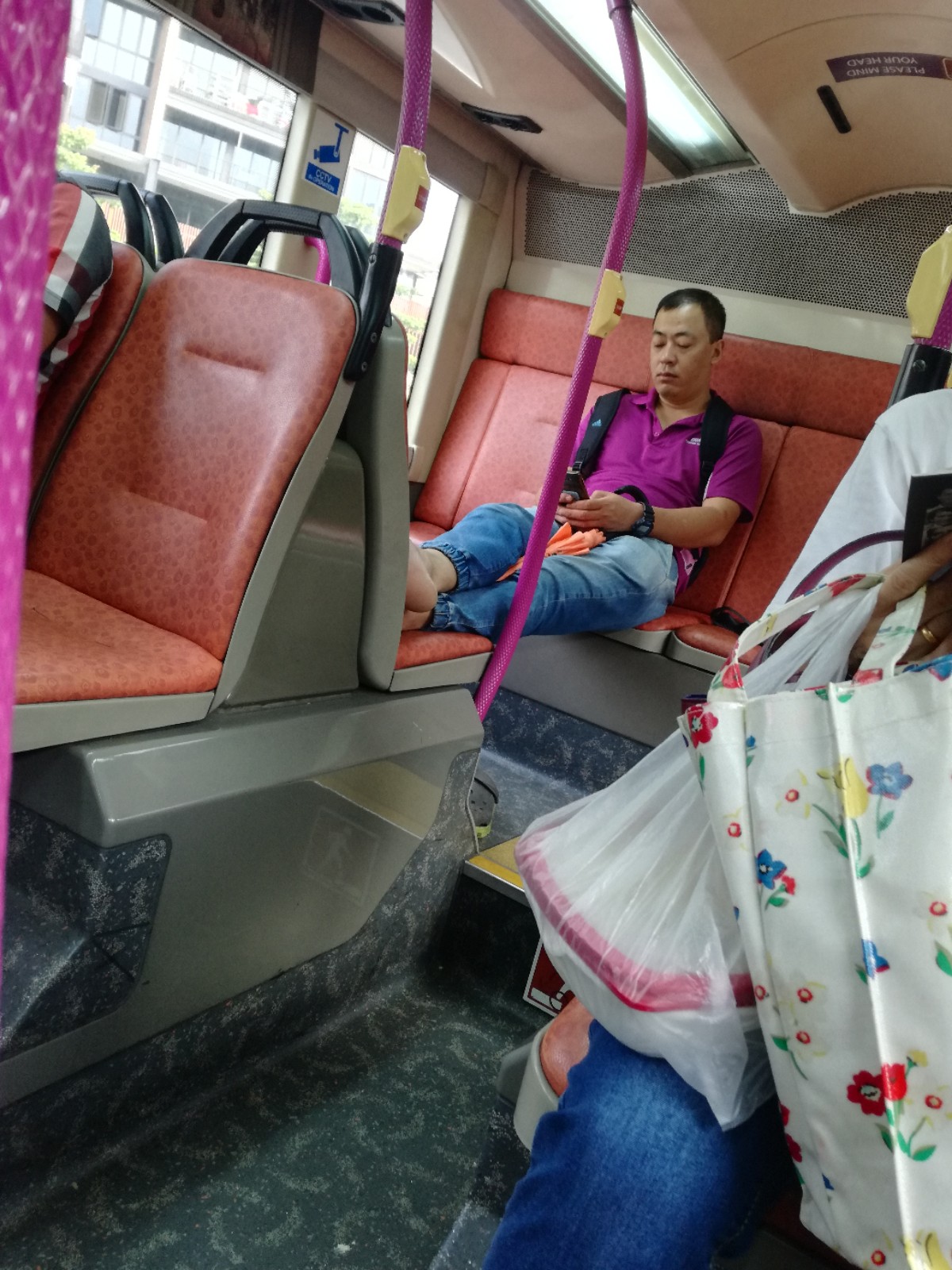 Man occupying 4 seats on the bus, can something be done about these selfish people?