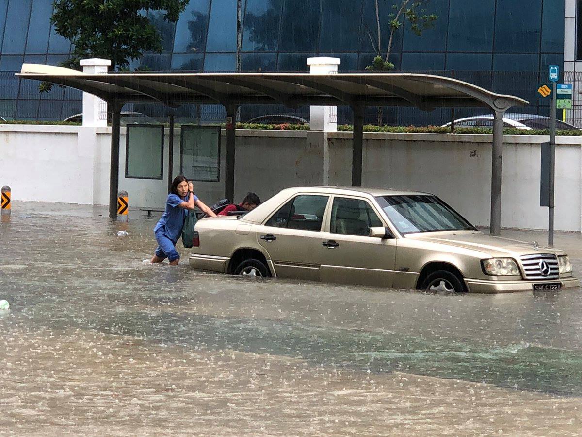 Heavy downpour today caused floods, tree collapse and even rain in HDB lift?!
