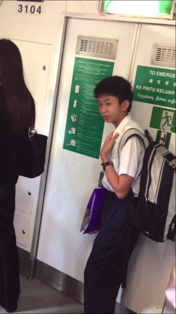 Student on MRT behaving strangely! Is school too stress?
