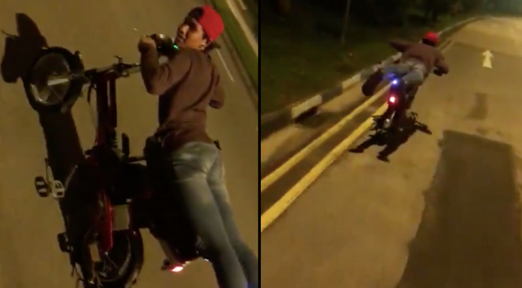 E-scooter rider does a dangerous ‘Superman’ stunt while riding on the road