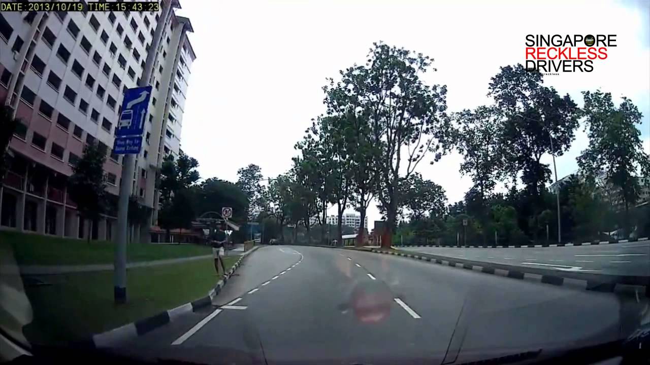 SG car dashes out unexpectedly from the least expected spot!