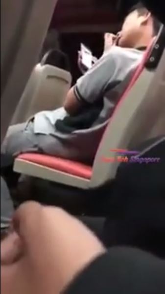 Gross! Man digs his nose on the bus then proceeds to wipe it on the seat!