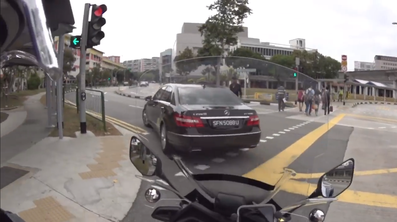 Using phone while driving? Fail to signal, never stop at pedestrian crossing and almost hit someone too!