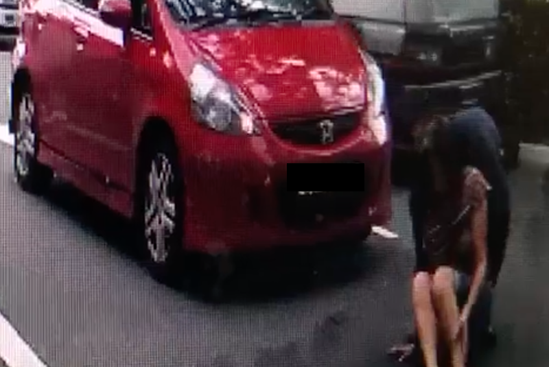 Driver knocks down woman along Ubi, but folks are focused on the inappropriate way he helped her up