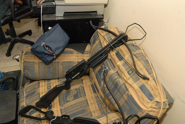 Crossbow Cannibal killer's chilling CCTV pose after butchering and eating victim