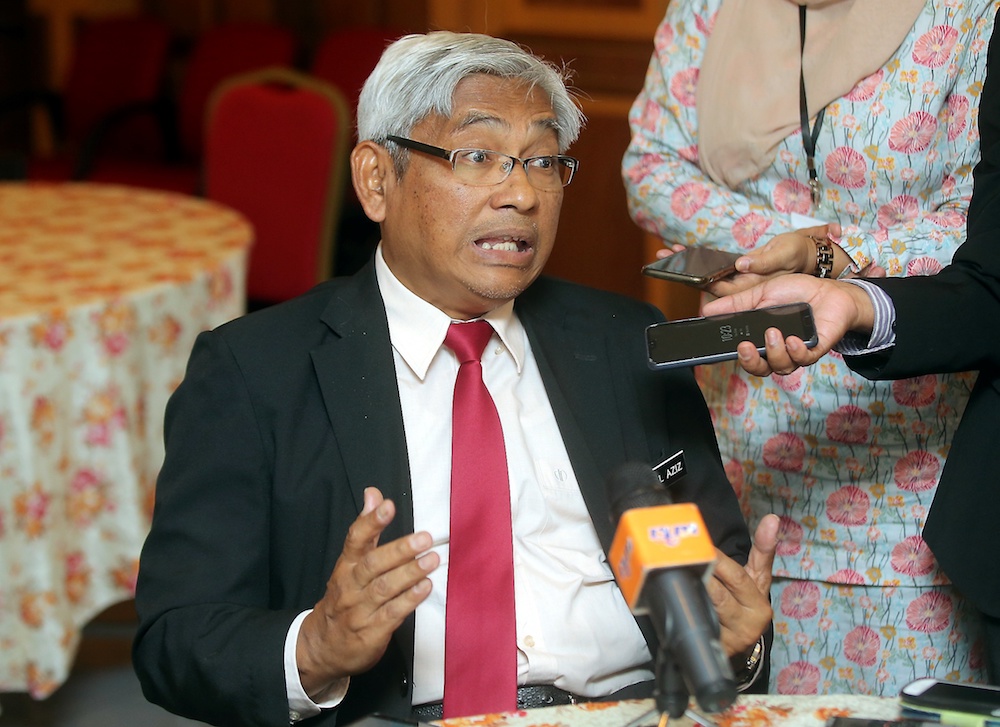 DAP’s Aziz Bari denies Yong's claims about Nga and Ngeh