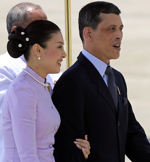 How Thailand's new queen met her husband while she was an air stewardess and he was a pilot before he made her a 'general' (unlike his poodle FuFu who he made Air Chief Marshal)