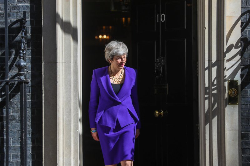 Theresa May should set resignation date next week, says lawmaker