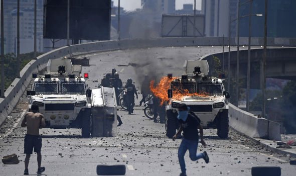 Venezuela uprising threatens to spill into Colombia and Brazil as Guaido supporters rage