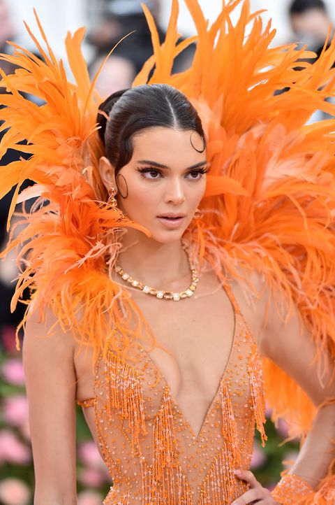 Kendall Jenner Came to Turn Heads in the Biggest Orange Feather Dress at the 2019 Met Gala
