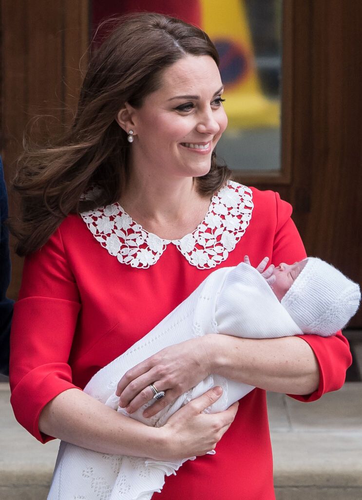 Prince Harry breaks with tradition by holding the royal baby