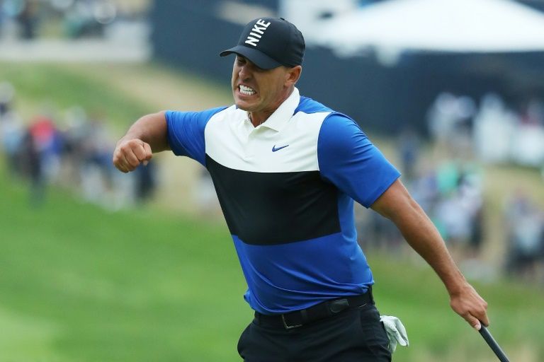 Koepka holds off late Johnson charge to win PGA Championship