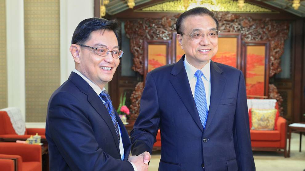 China will treat businesses equally, continue to uphold free trade: Li Keqiang