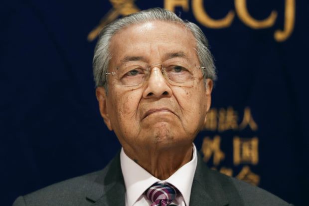 Dr M condemns stupidity of trade wars