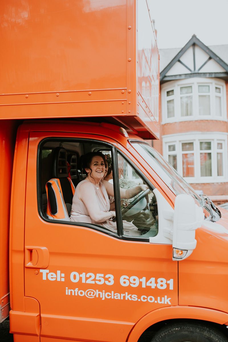 Bride Explains The Touching Reason She Showed Up To Her Wedding In A Bright Orange Moving Van