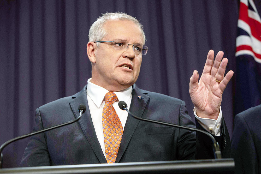 World about to be gripped by coronavirus pandemic, Australia's Morrison says