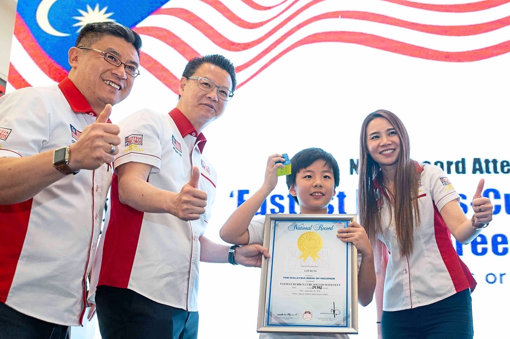 Malaysian 11-year-old is the Asian champion for Speedcubing with his feet