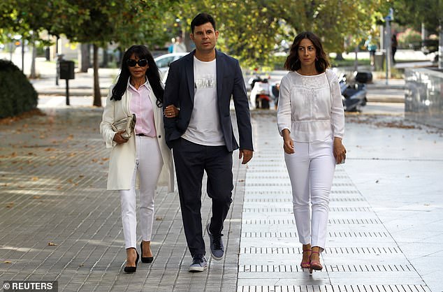 Mother who claims her son, 44, is Julio Iglesias's lovechild leaves court smiling after paternity hearing is told there is strong evidence the singer IS the father, even without a DNA test