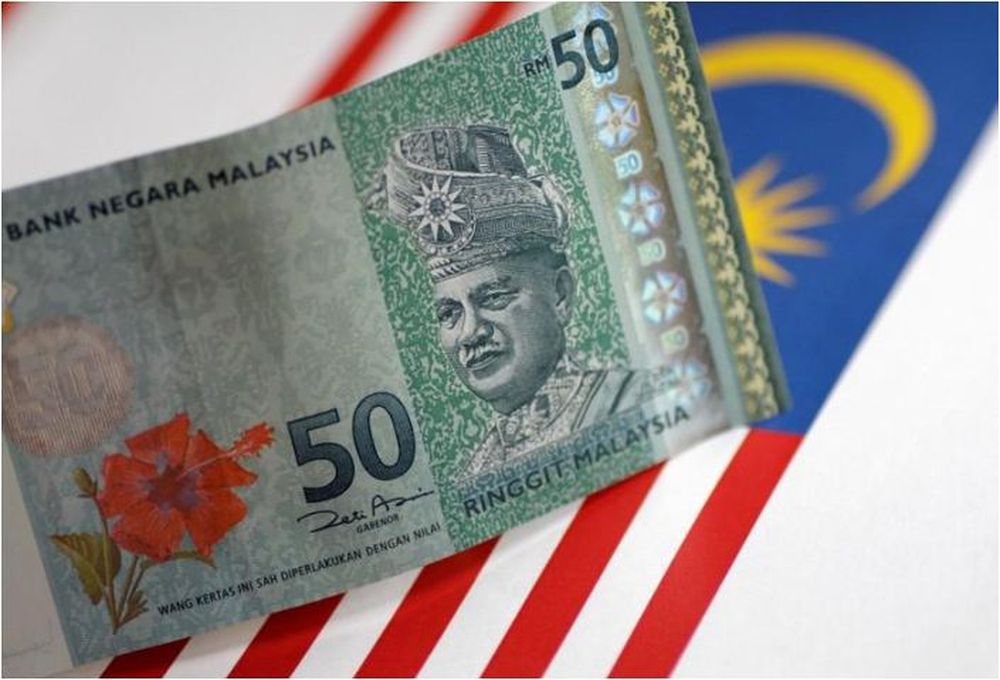 Ringgit slips further at the close