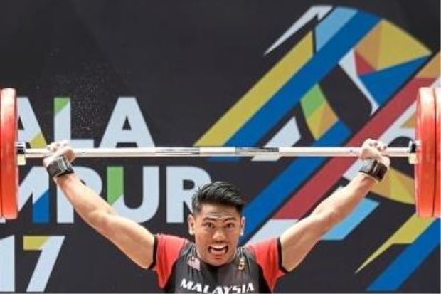 Aznil and Erry carry the weight of winning medals in Samoa