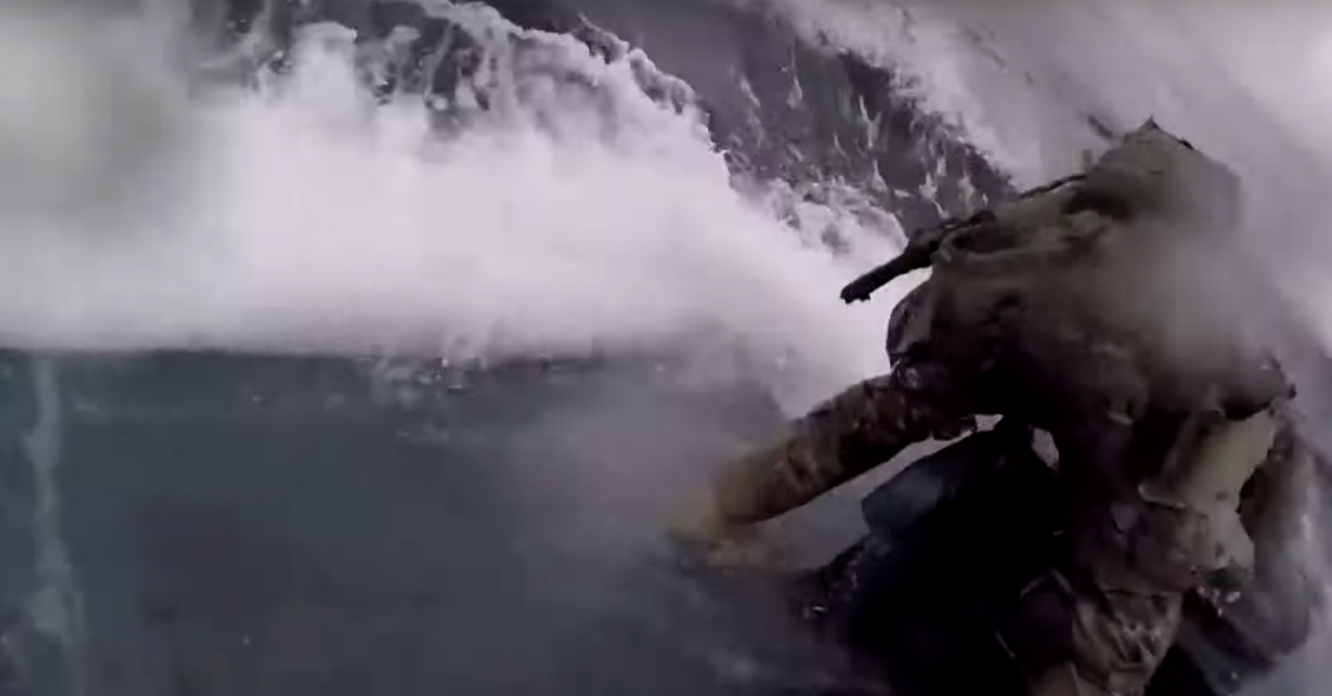 Insane video shows coast guardsman jumping onto drug cartel submarine in middle of ocean