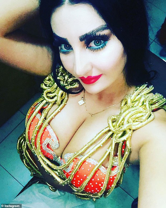 Armenian belly dancer faces deportation from Egypt for 'inciting debauchery' after she is filmed inviting bikini-clad women on stage for an 'explicit' performance