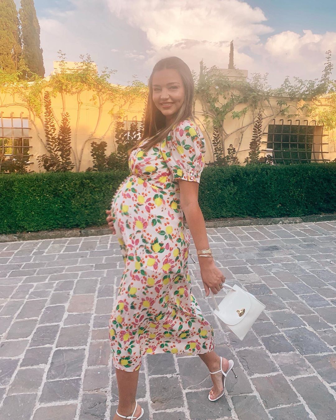 Model Mama-to-Be! Pregnant Miranda Kerr Cradles Her Baby Bump in Sunny Snap