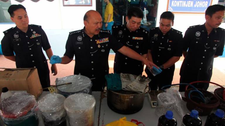 Police uncover drug processing lab on Mersing cattle farm