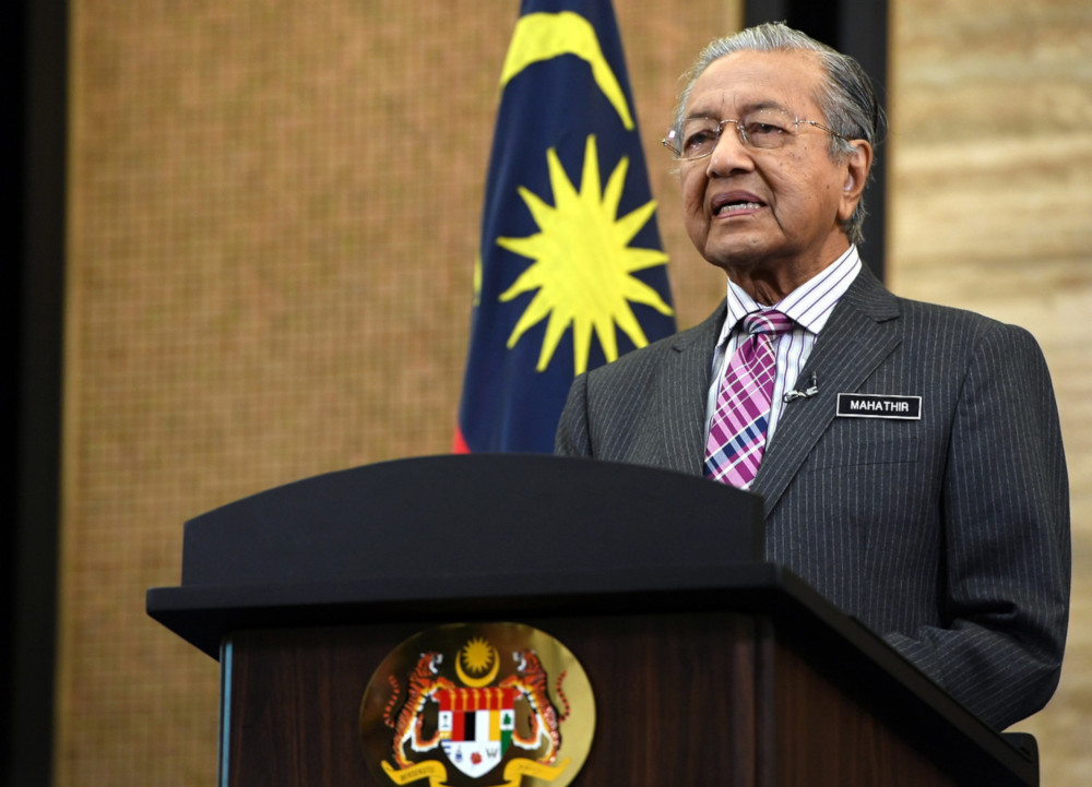 Keep improving yourselves to drive country forward, Dr M tells Malaysians