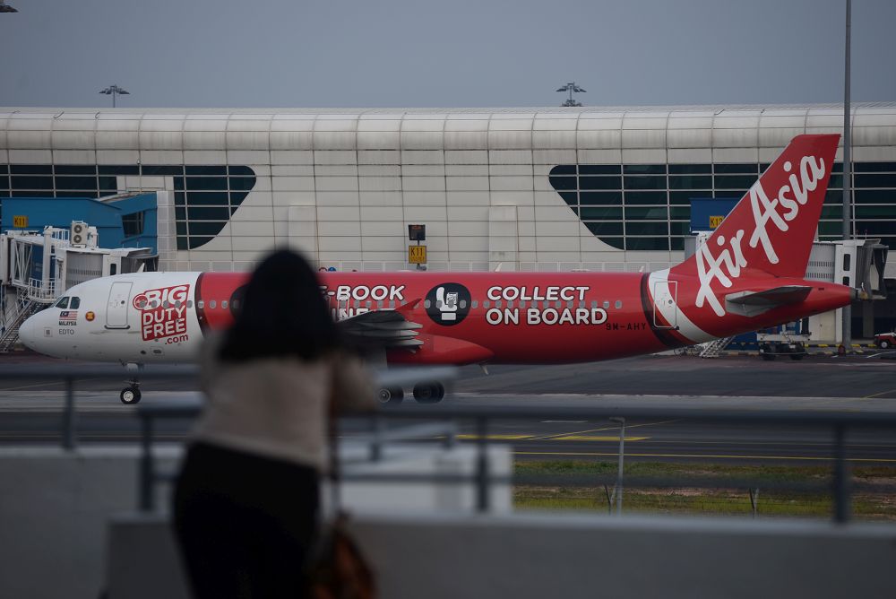 With aviation sector grounded, sources say AirAsia looking to cut headcount