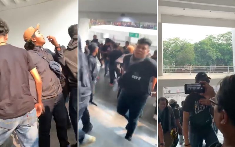 Rocks thrown as Malaysian football fans approach stadium in Indonesia
