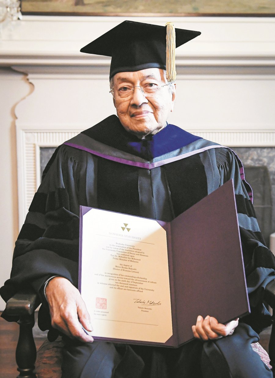 日本同志社大学表扬贡献　敦马获颁人文学荣誉博士
