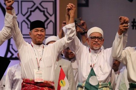 In push for race and religion, Malaysian opposition formalises pact