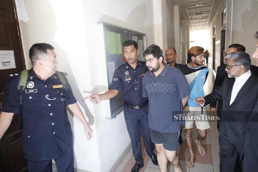 Bodies in suitcases: Two brothers charged with murder