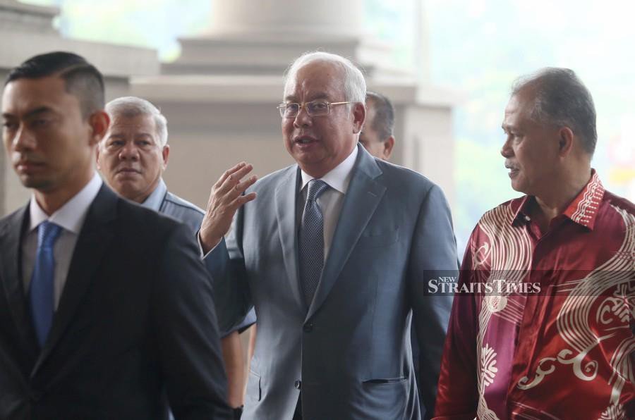 Jho Low prepared report on China trip, says Najib's ex-special aide