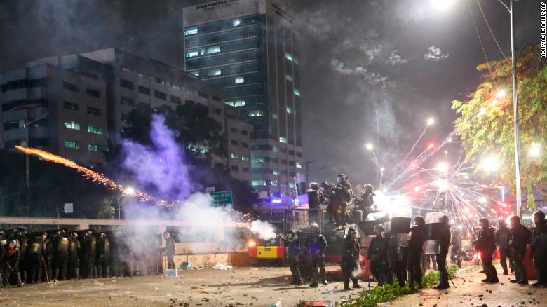 Indonesian police fire tear gas, water cannons, as students protest law that would criminalize extramarital sex