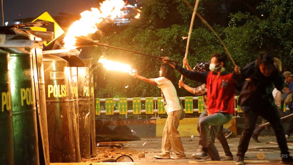 Clashes erupt even as Indonesia delays vote on major legal reforms
