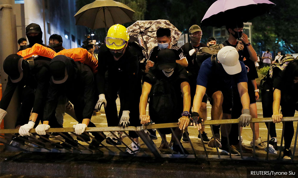 Hong Kong police fire tear gas, water cannon to halt protest