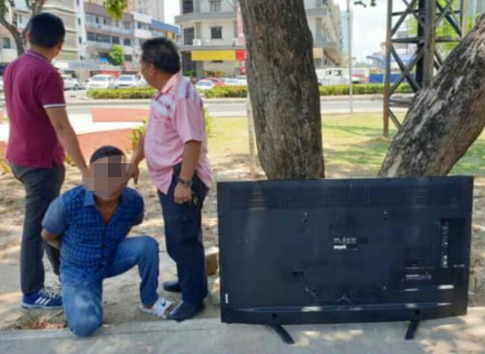 Ex-convict held for stealing TV
