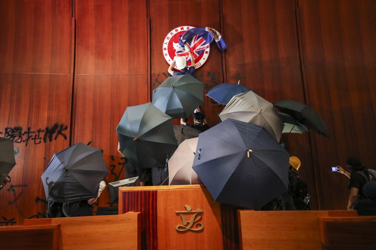 Hong Kong protests: three arrested over July 1 storming of Legislative Council, according to reports, in police swoop of high-profile activists ahead of National Day