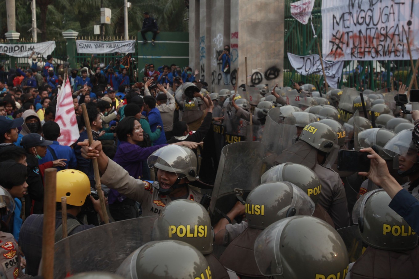 Thirteen police officers questioned over deaths of student protesters in Kendari