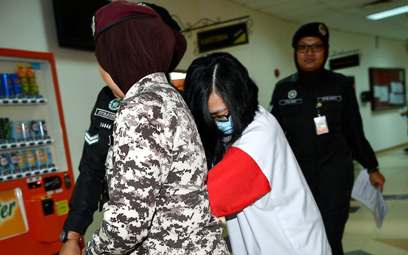 Appeals court frees woman sentenced to death for husband’s murder