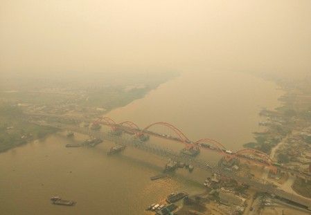 Indonesia shuts some schools as haze again clouds the skies