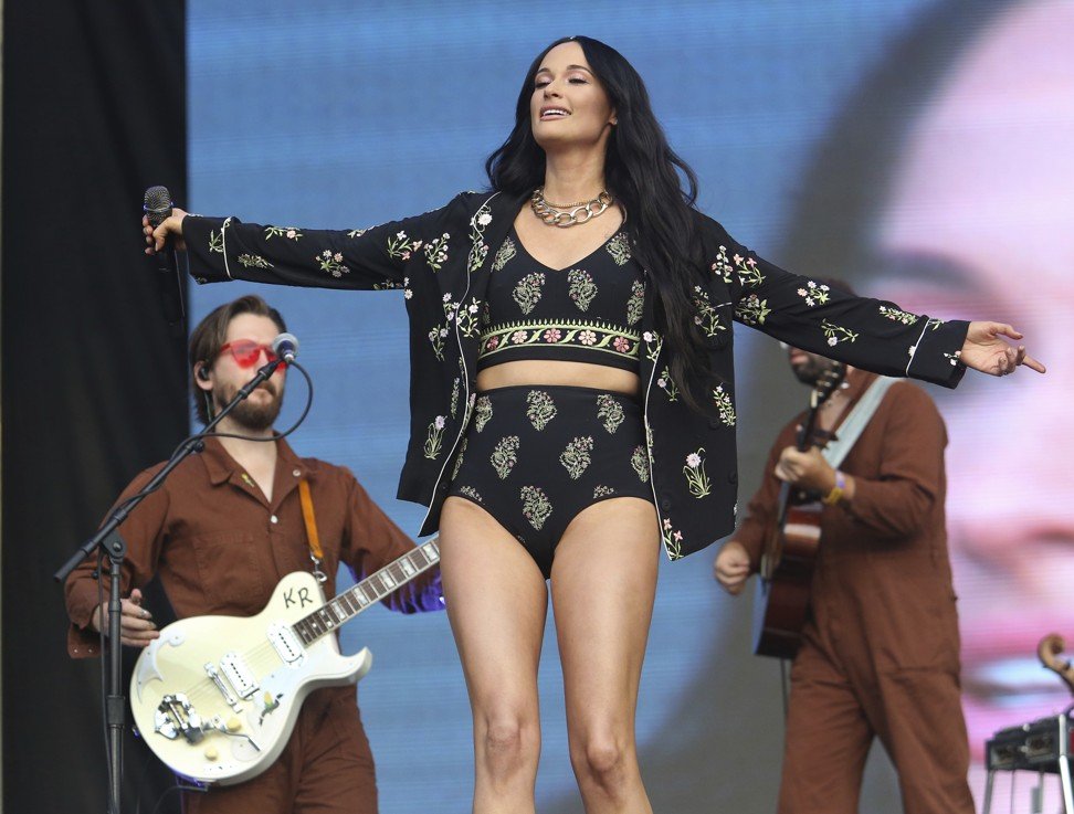 US singer Kacey Musgraves slammed for sexualising Vietnamese ao dai by wearing only top half of outfit