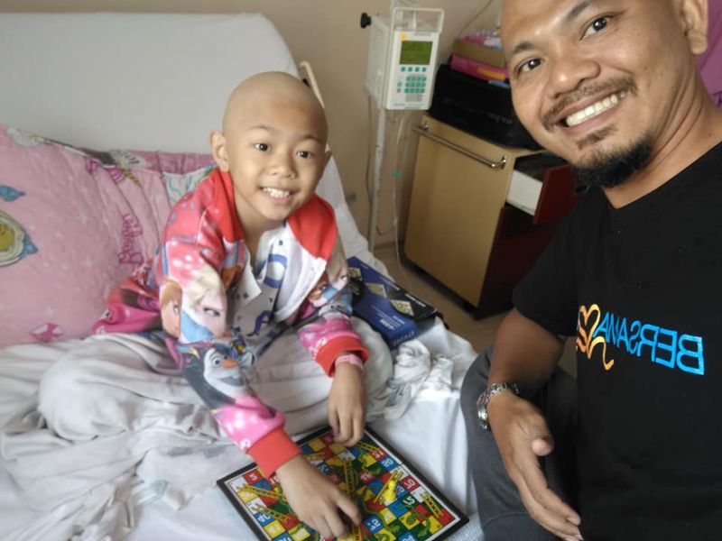 ‘Anything to cheer her up’: Johor dad goes bald to support nine-year-old daughter with bone cancer
