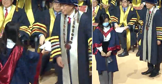 Hong Kong university official refuses to shake hands with students wearing masks during graduation ceremony
