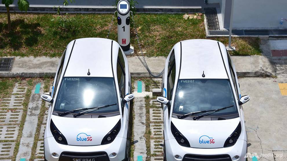 What is keeping electric cars from gaining greater acceptance in Singapore?